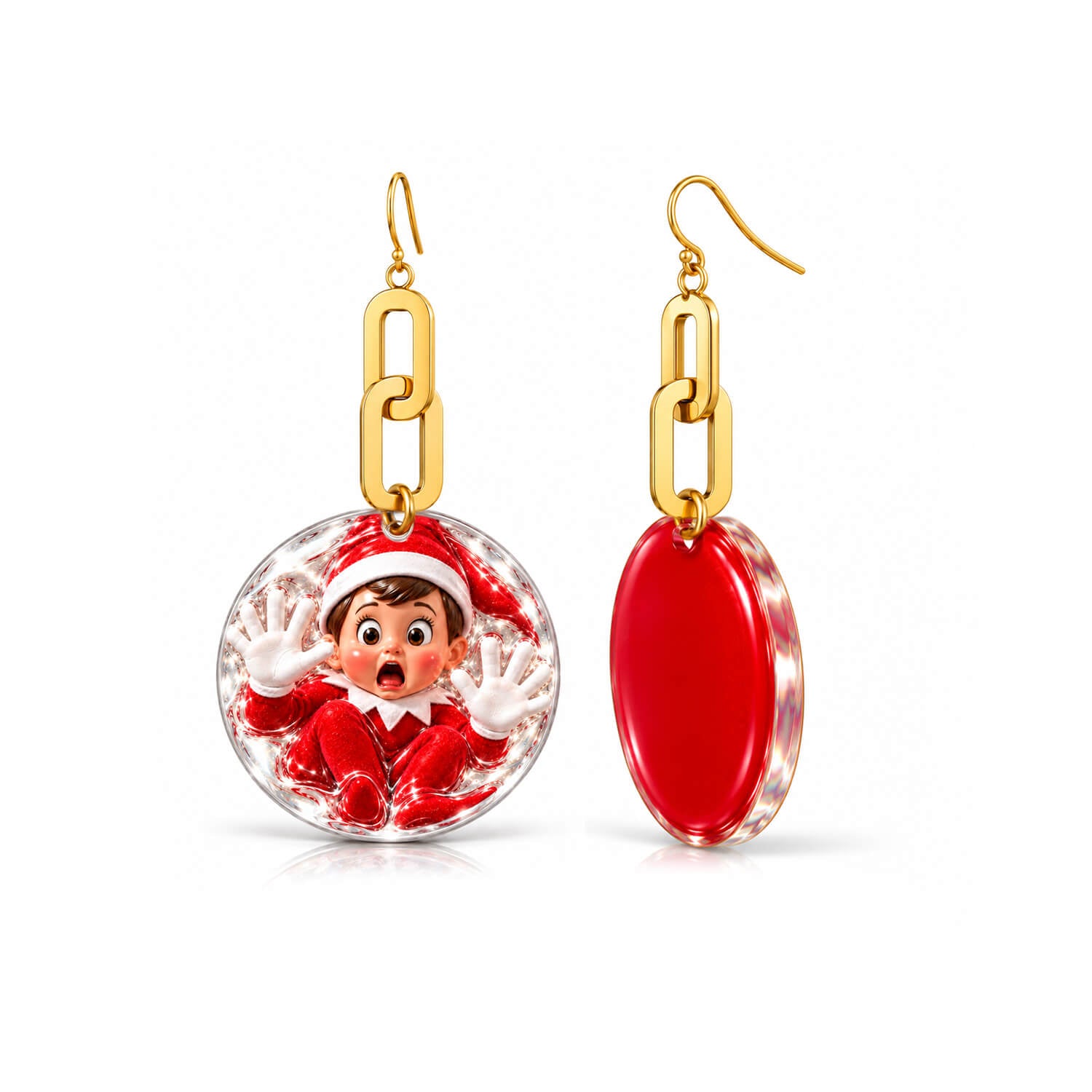 A pair of gold-tone dangle earrings on a white background. One earring is front-facing and shows a circular clear pendant with a cartoon elf in a red Santa outfit inside, suspended by gold chain links.