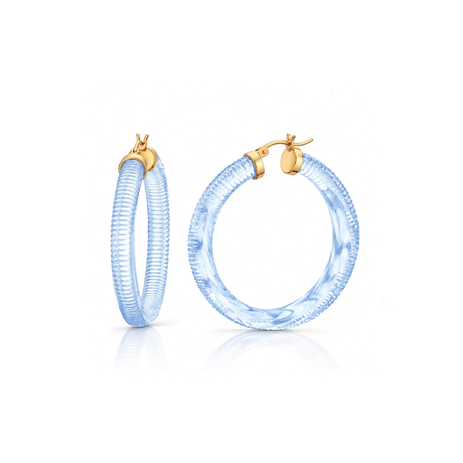 light blue hoop earrings with texture on a white background