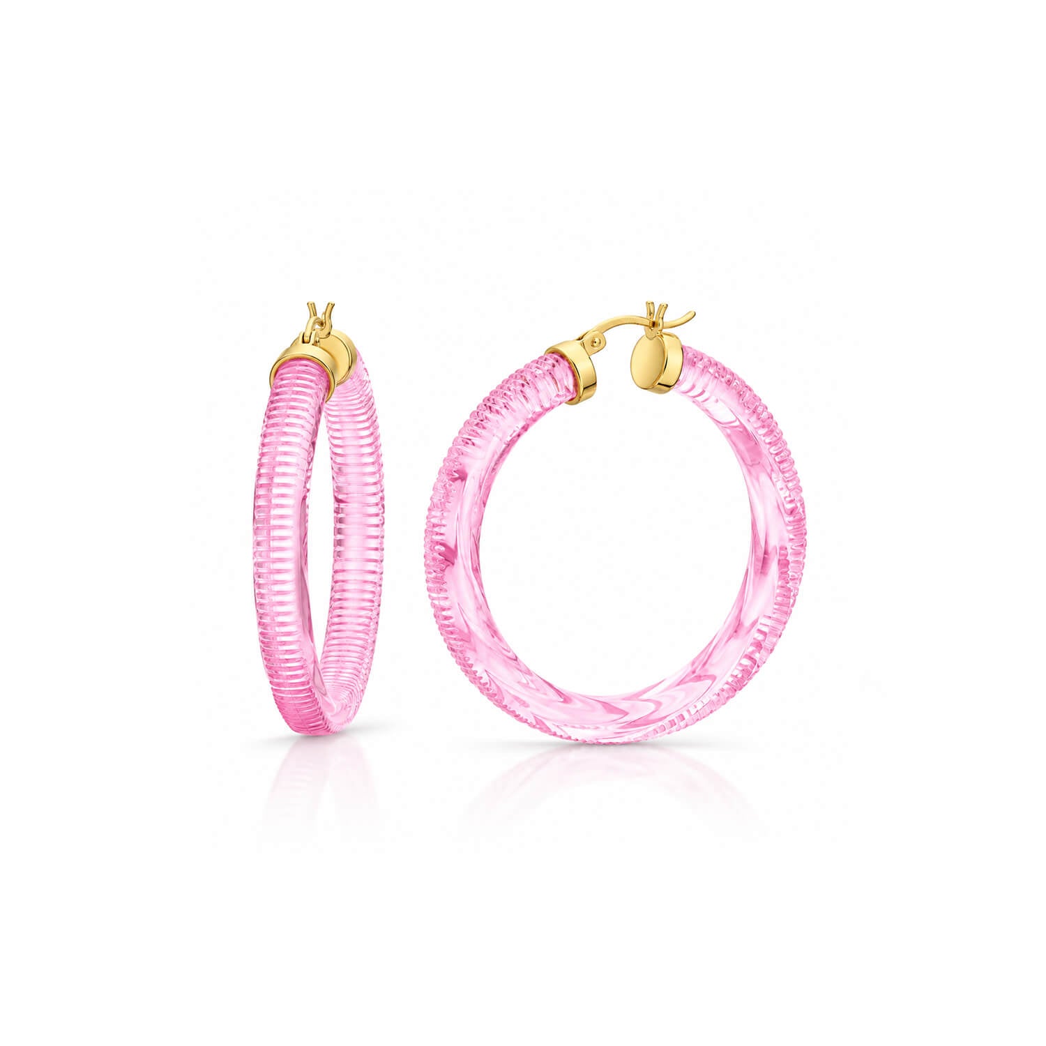 light pink hoop earrings with texture on a white background