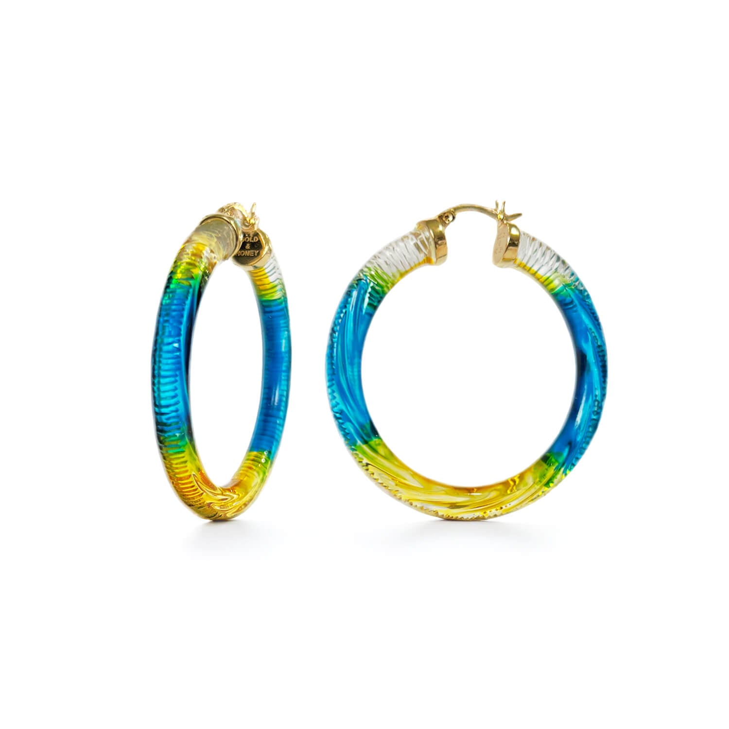 diamond cut earrings in yellow and blue lucite