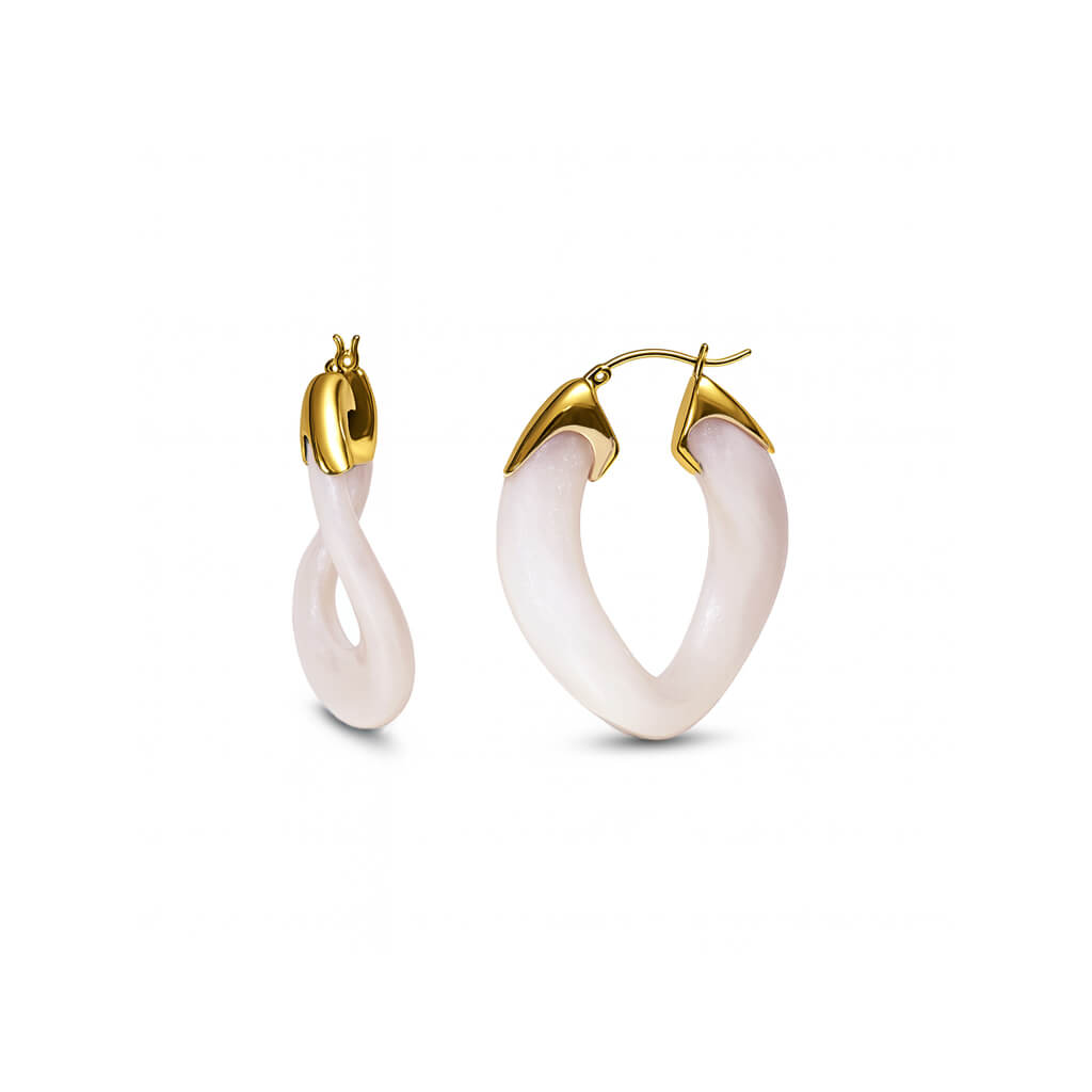 Pair of white hoop earrings with gold accents on a white background