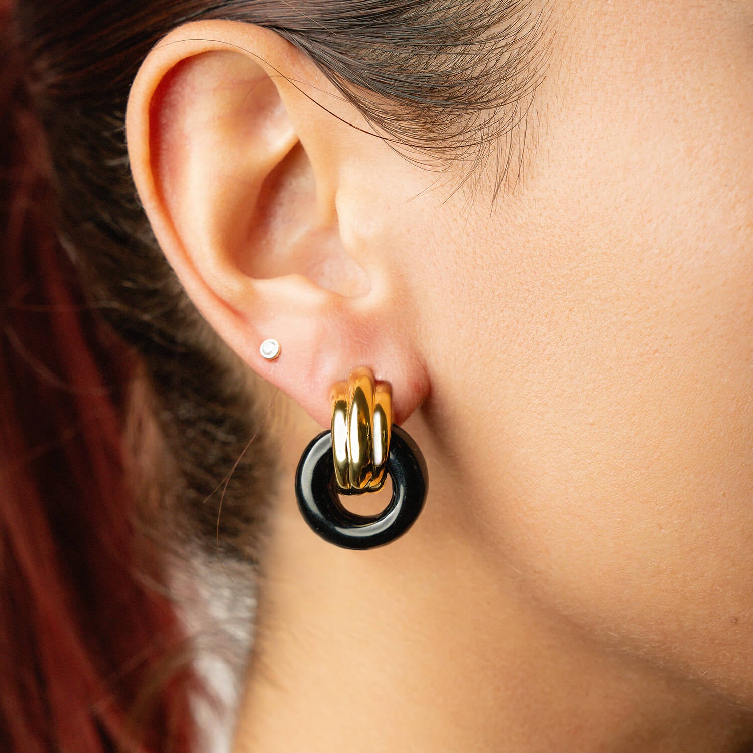 classic gold door knocker earrings in black lucite