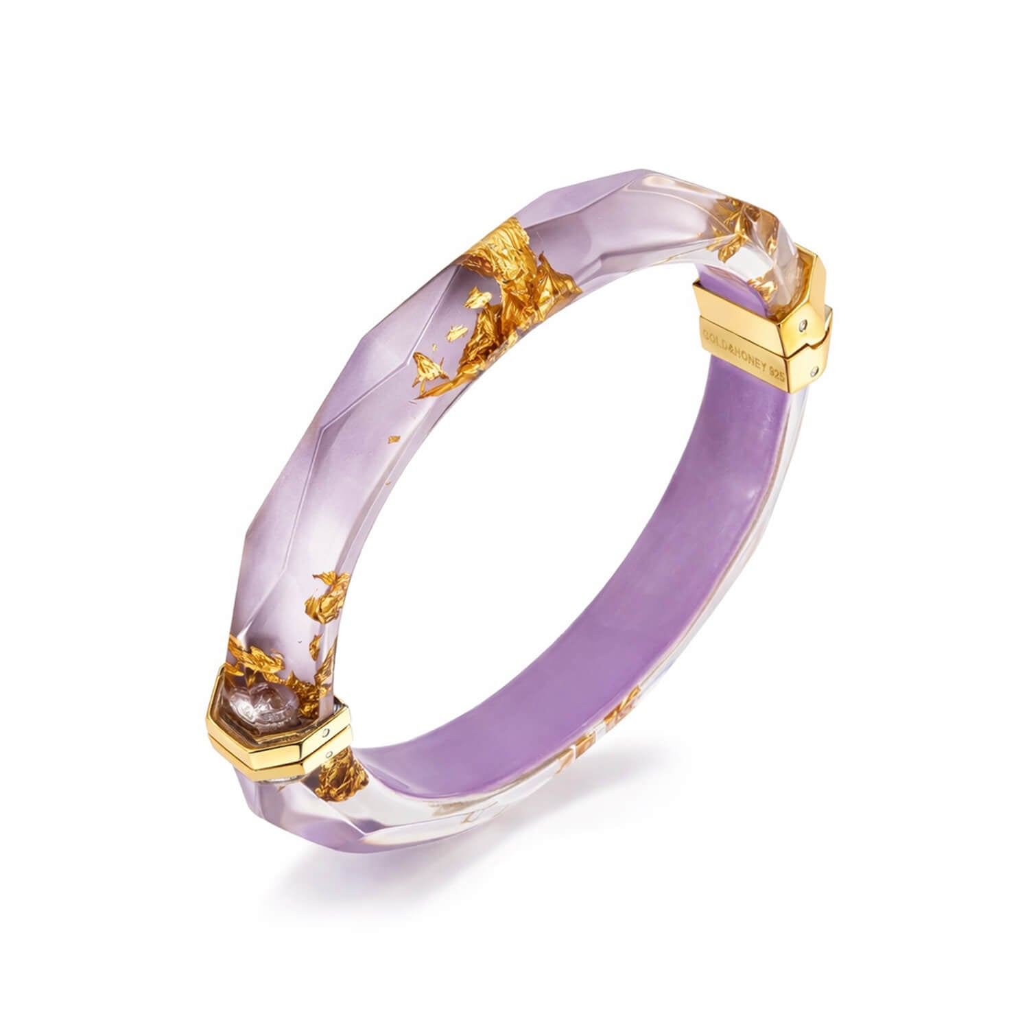 Purple bracelet with gold accents on a white background