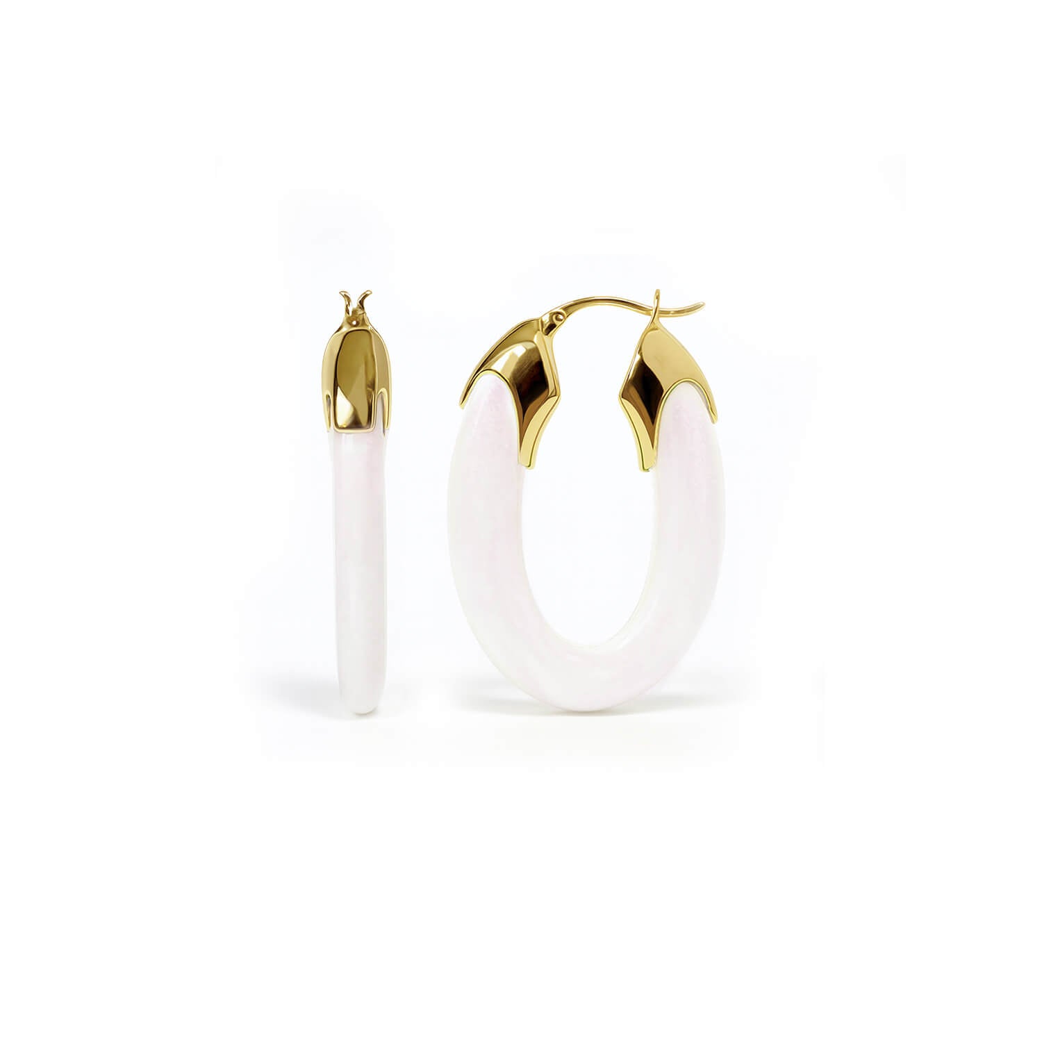 Gold and white hoop earrings on a white background