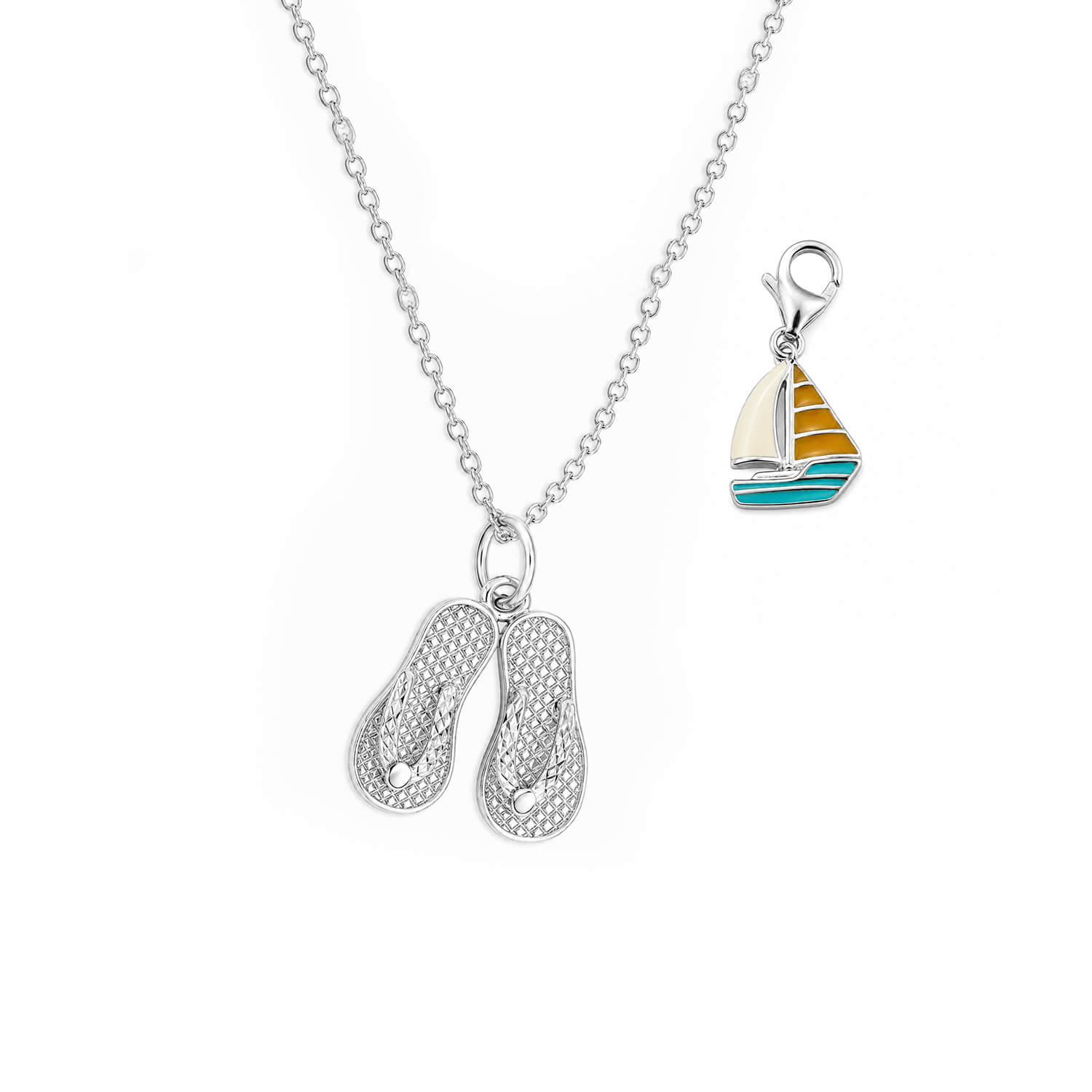 Necklace with a sailboat pendant on a white background
