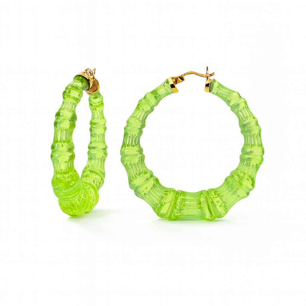 Pair of green bamboo hoop earrings on a white background
