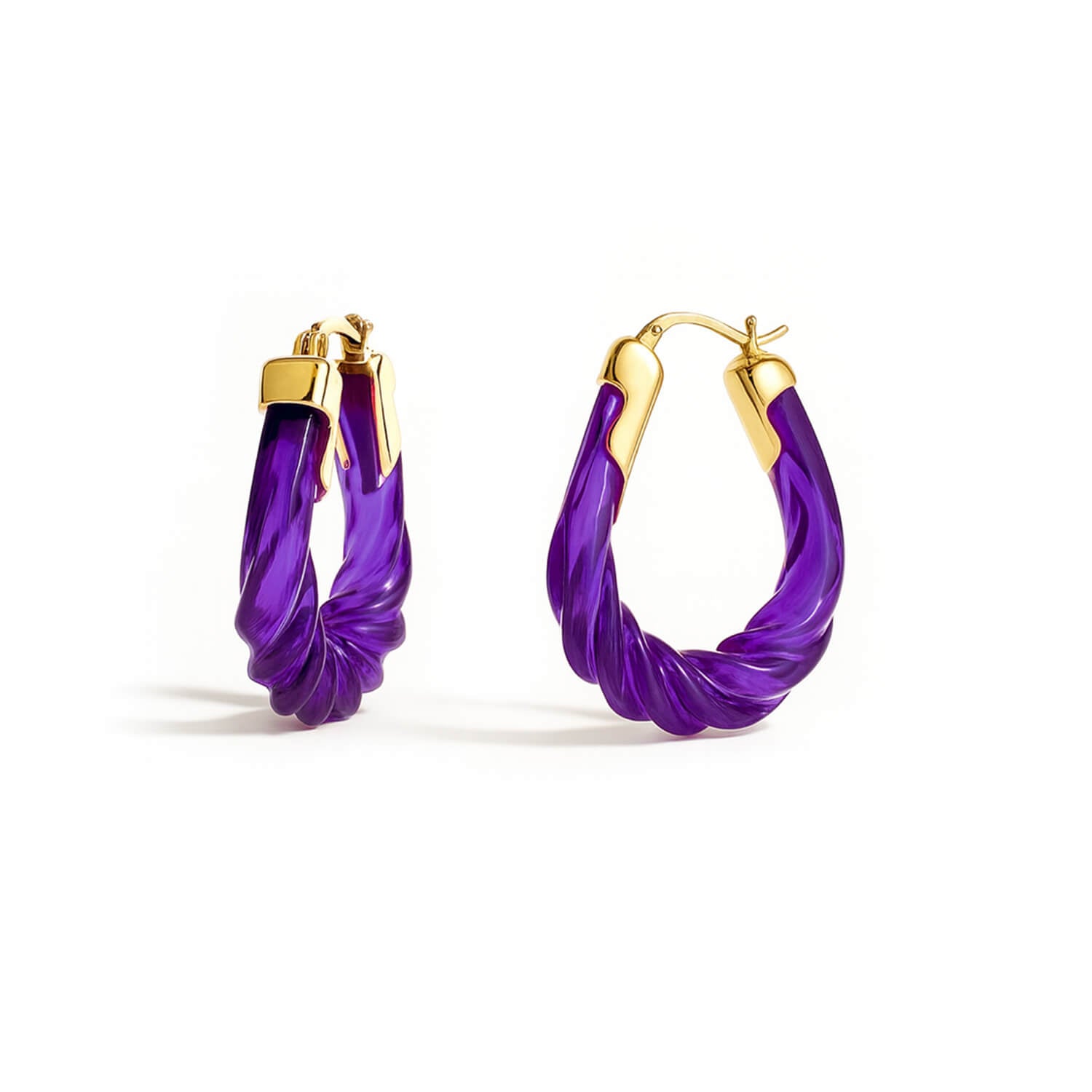 Purple hoop earrings with gold accents on a white background