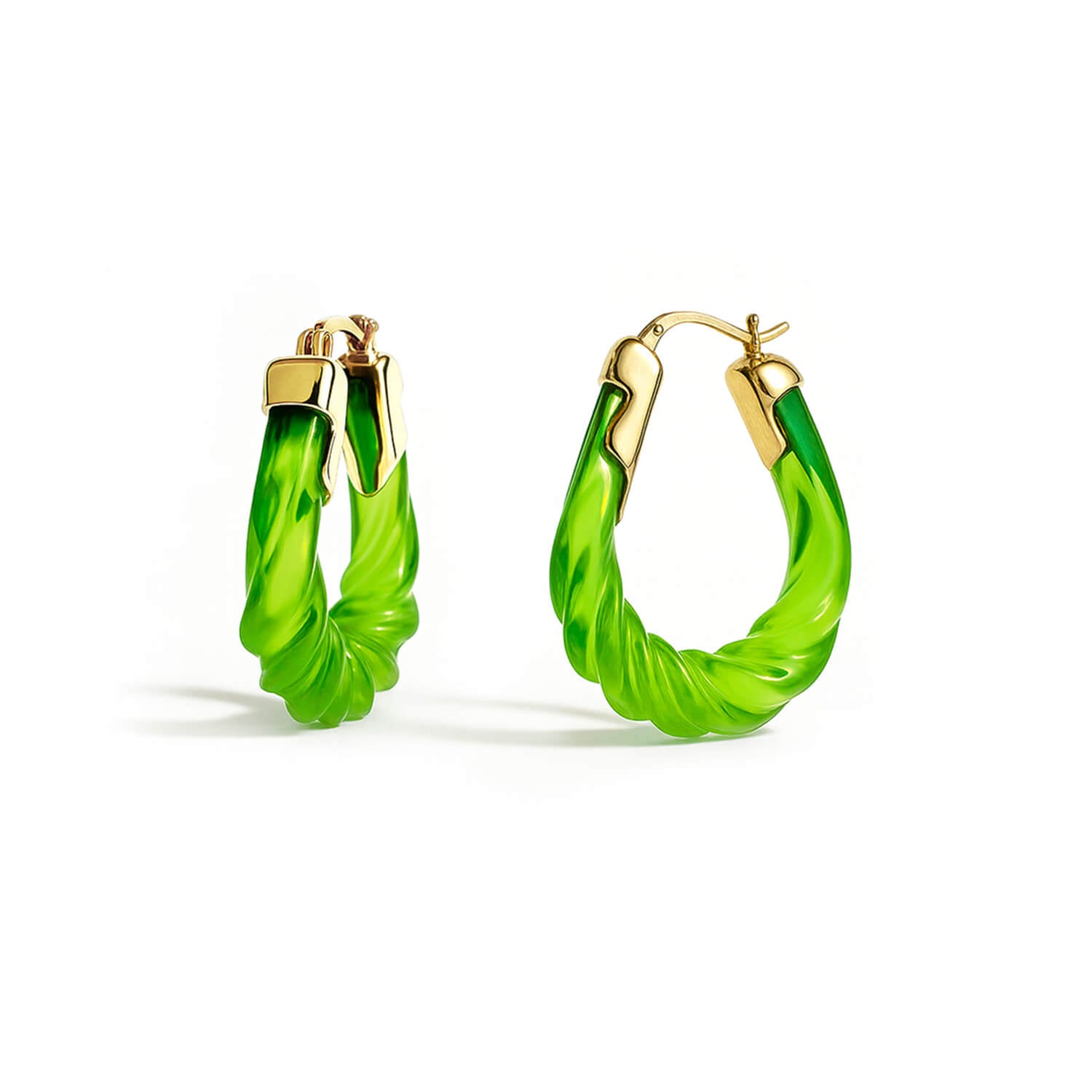 Green hoop earrings with gold accents on a white background
