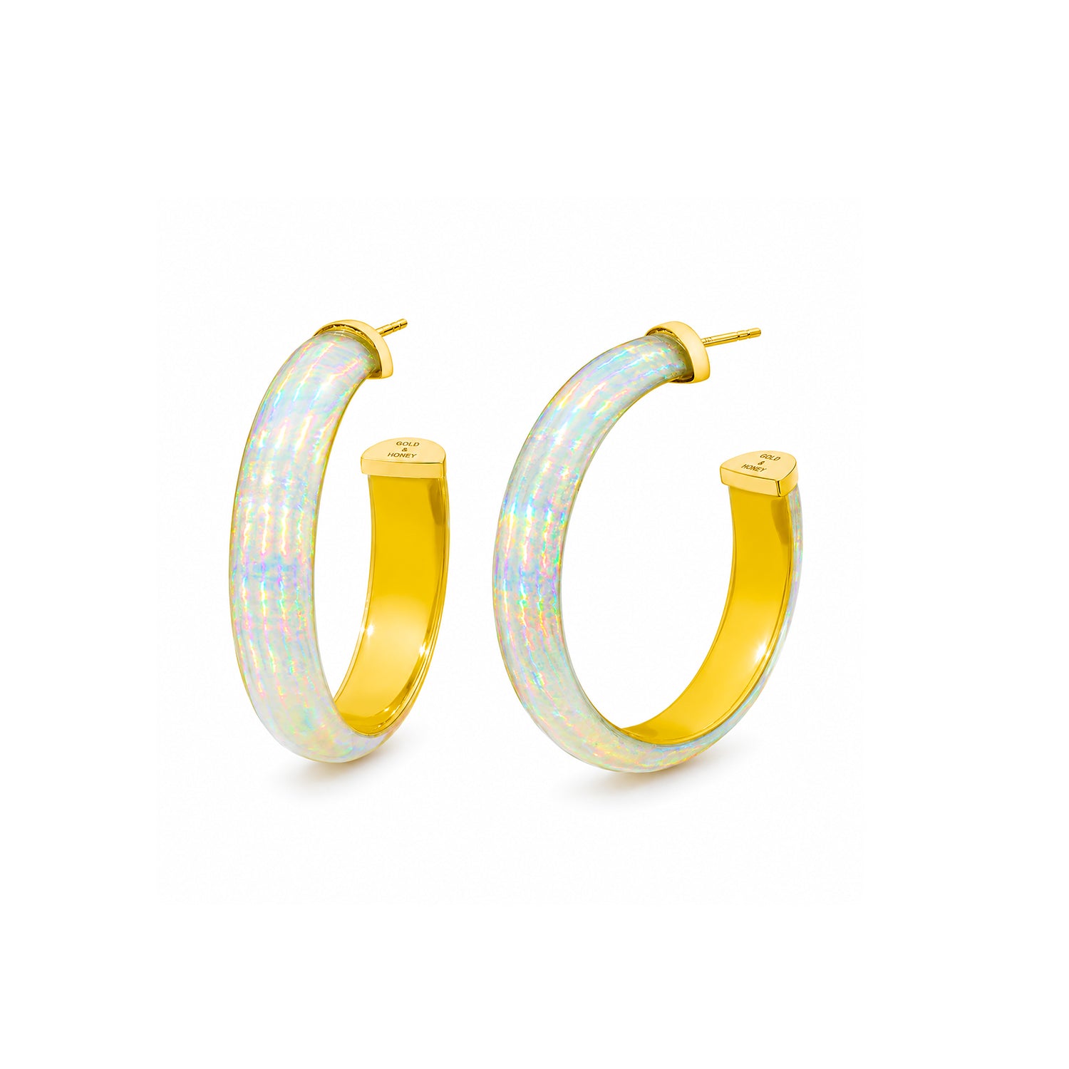 A pair of gold hoop earrings with a white iridescent opal-like inlay, shown on a clean white background.