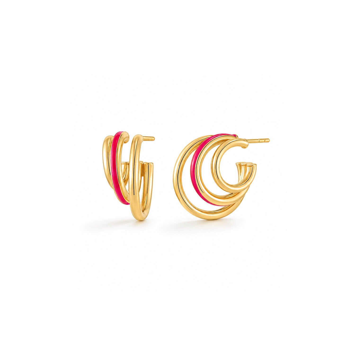 A pair of gold hoop earrings with three gold hoops, featuring a vibrant hot pink enamel inlay, shown on a clean white background.