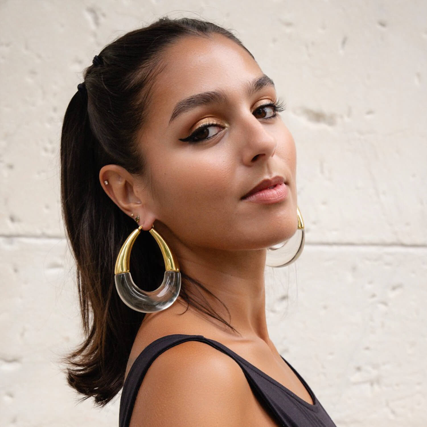XL gold and clear bucket hoop earrings on model - 2