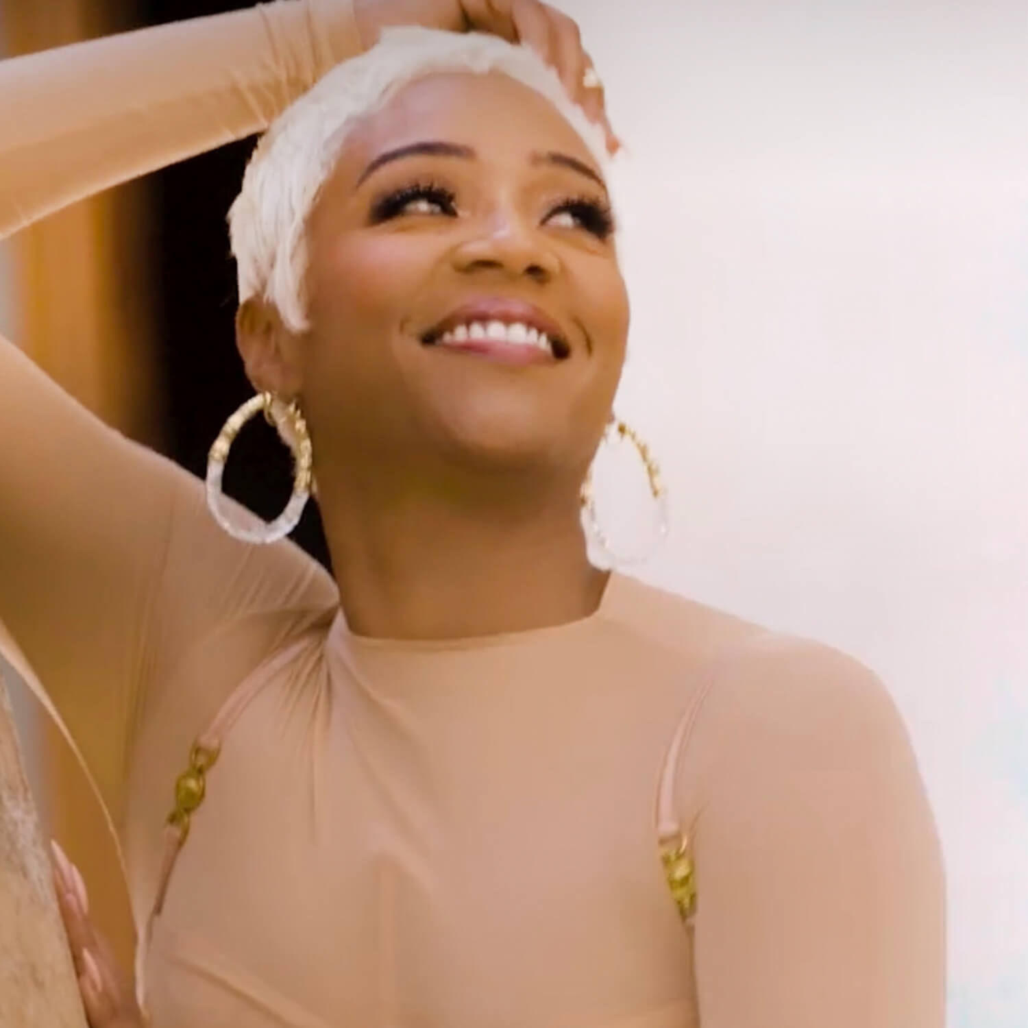 Tiffany Haddish in Duchess Lucite Bamboo Hoops