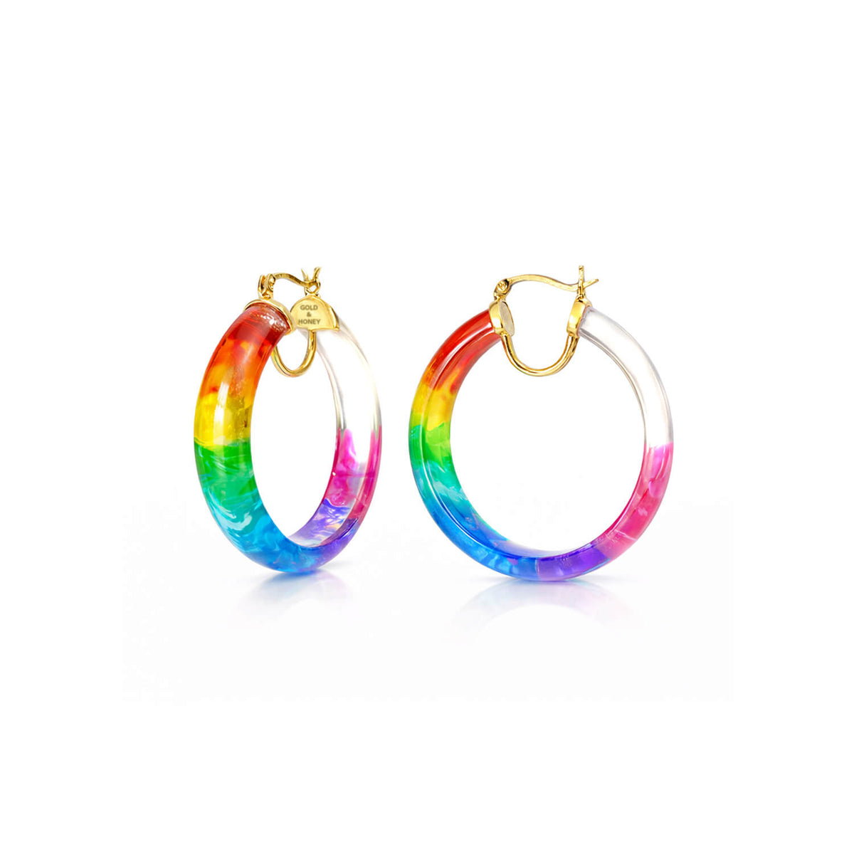 Rainbow hoop earrings with gold accents on a white background