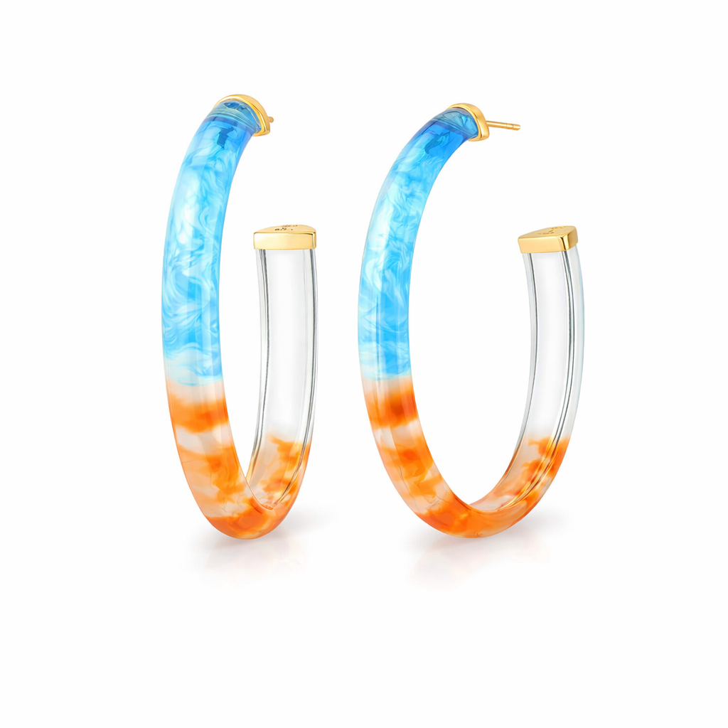 Hoop earrings with blue and orange gradient design on a white background