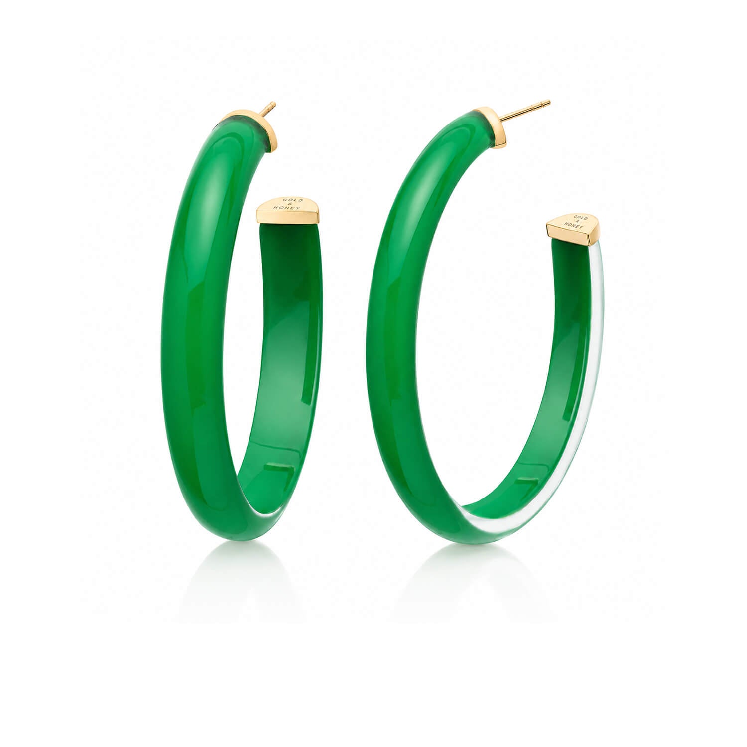 A pair of green hoop earrings with gold post and backing, displayed on a clean white background.