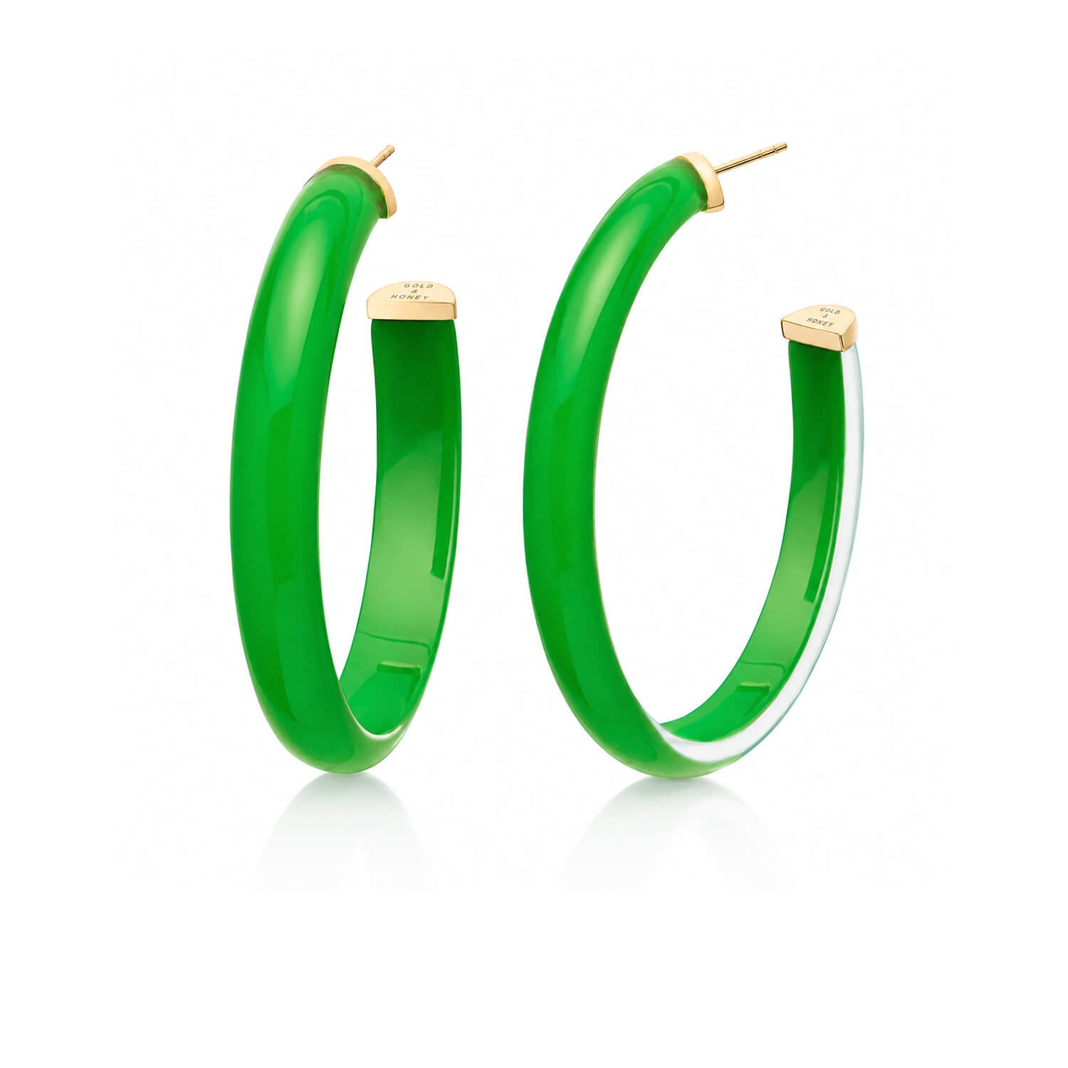 A pair of vibrant green hoop earrings with gold post and backing, displayed on a clean white background.