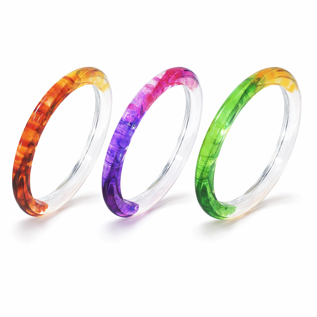 Three colorful bangles on a white background