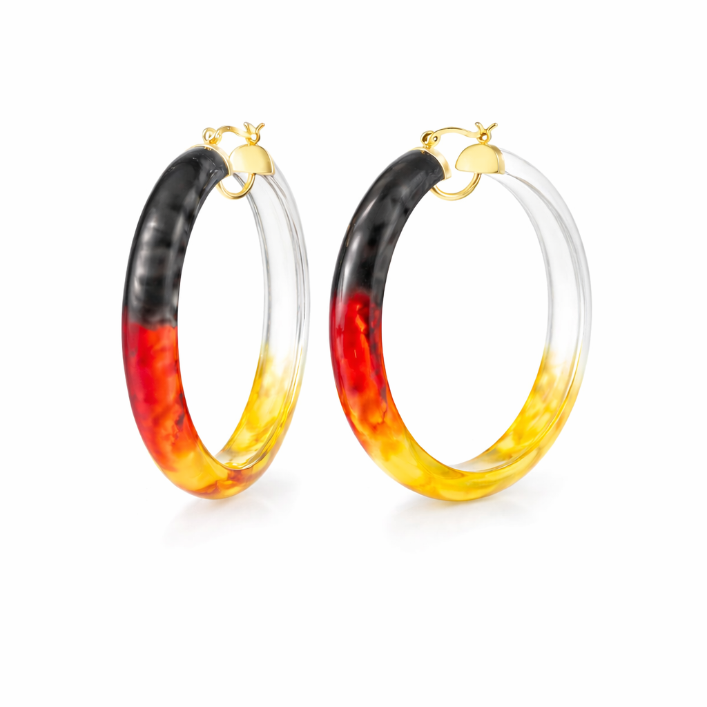 Hoop earrings with gradient black, red, and yellow design on a white background