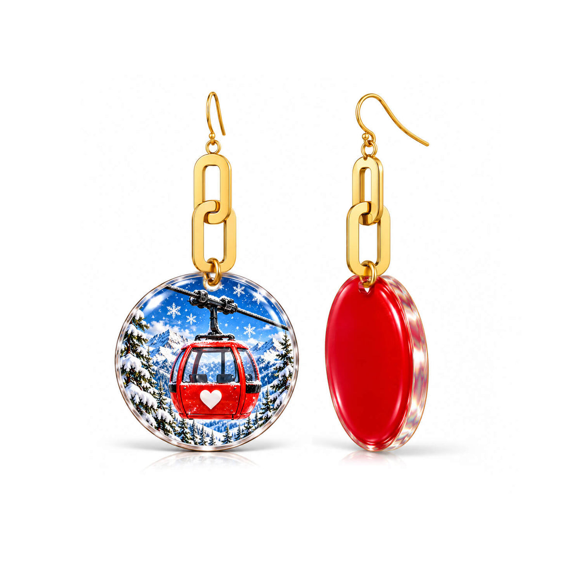 A pair of gold-tone dangle earrings on a white background. One earring shows a round pendant with a colorful winter ski gondola scene, and the other shows the red oval back of the pendant.