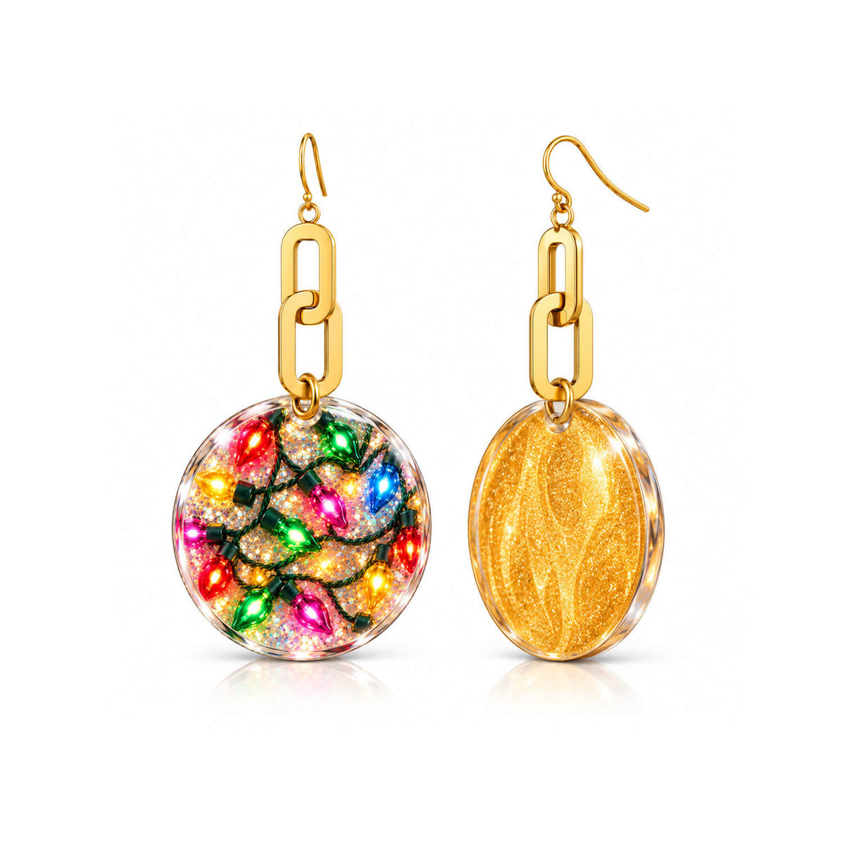 A pair of gold dangle earrings on a white background. One earring is shown from the front, featuring a clear oval disc filled with colorful Christmas string lights and silver glitter.