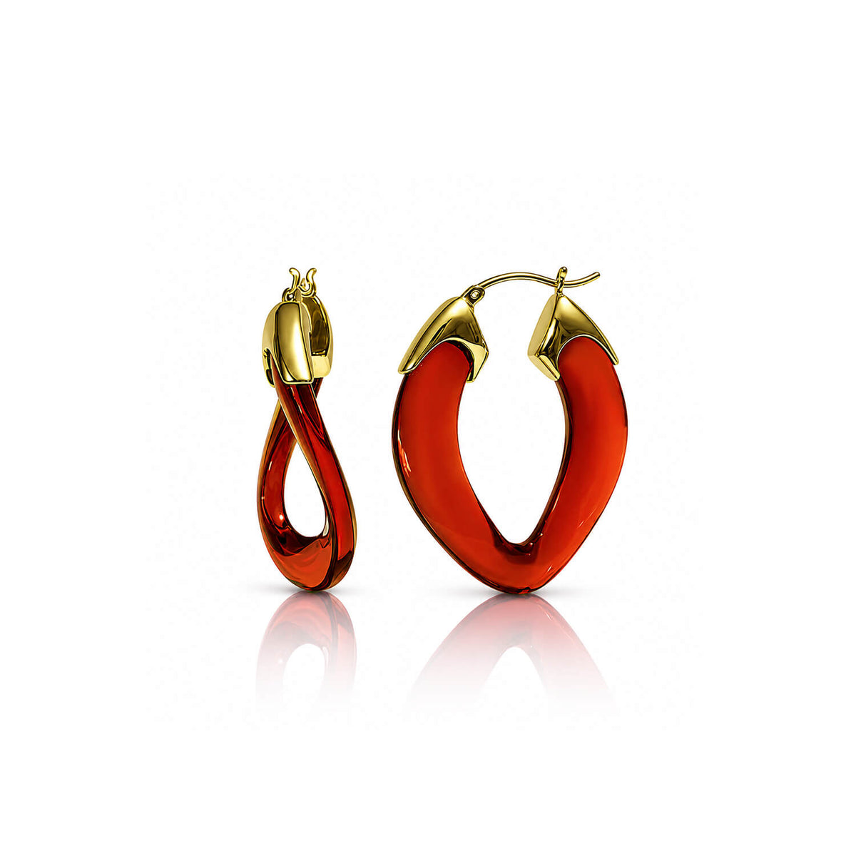 A pair of gold hoop earrings with curved, openwork red enamel sections, displayed on a clean white background with a soft reflection below.
