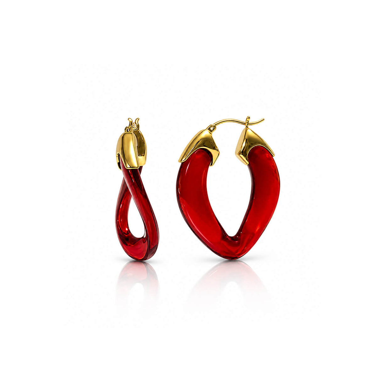 A pair of gold hoop earrings with translucent red curved drop charms, displayed on a clean white background with a soft reflection.