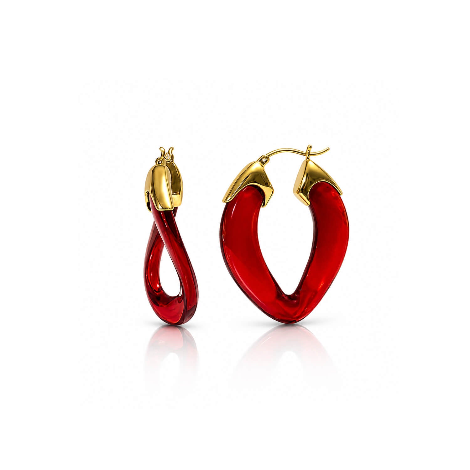 A pair of gold hoop earrings with translucent red curved drop charms, displayed on a clean white background with a soft reflection.