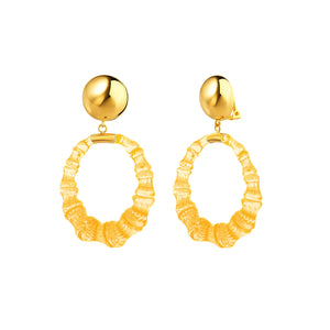 Clip on lucite bamboo earrings in honey orange
