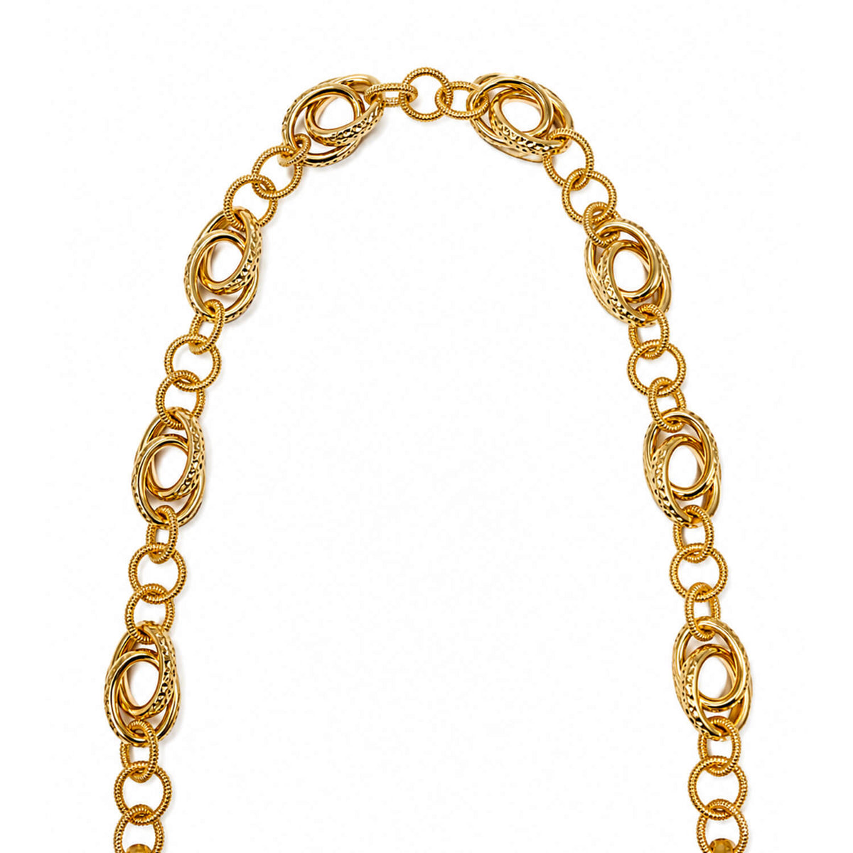 DOUBLE DC LINK CHAIN IN GOLD ON A WHITE BACKGROUND