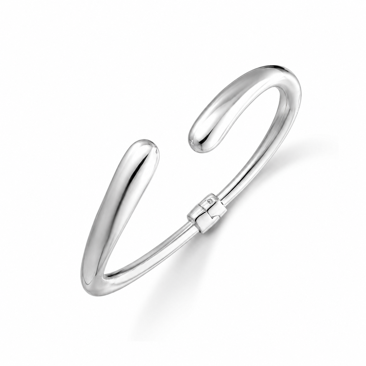 High polish cuff bangle on a white background