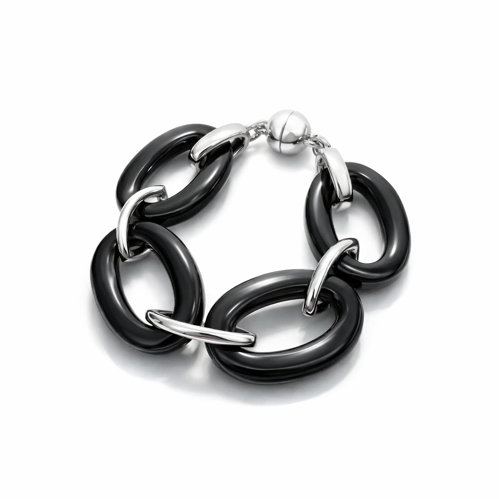 Black and silver bracelet on a white background