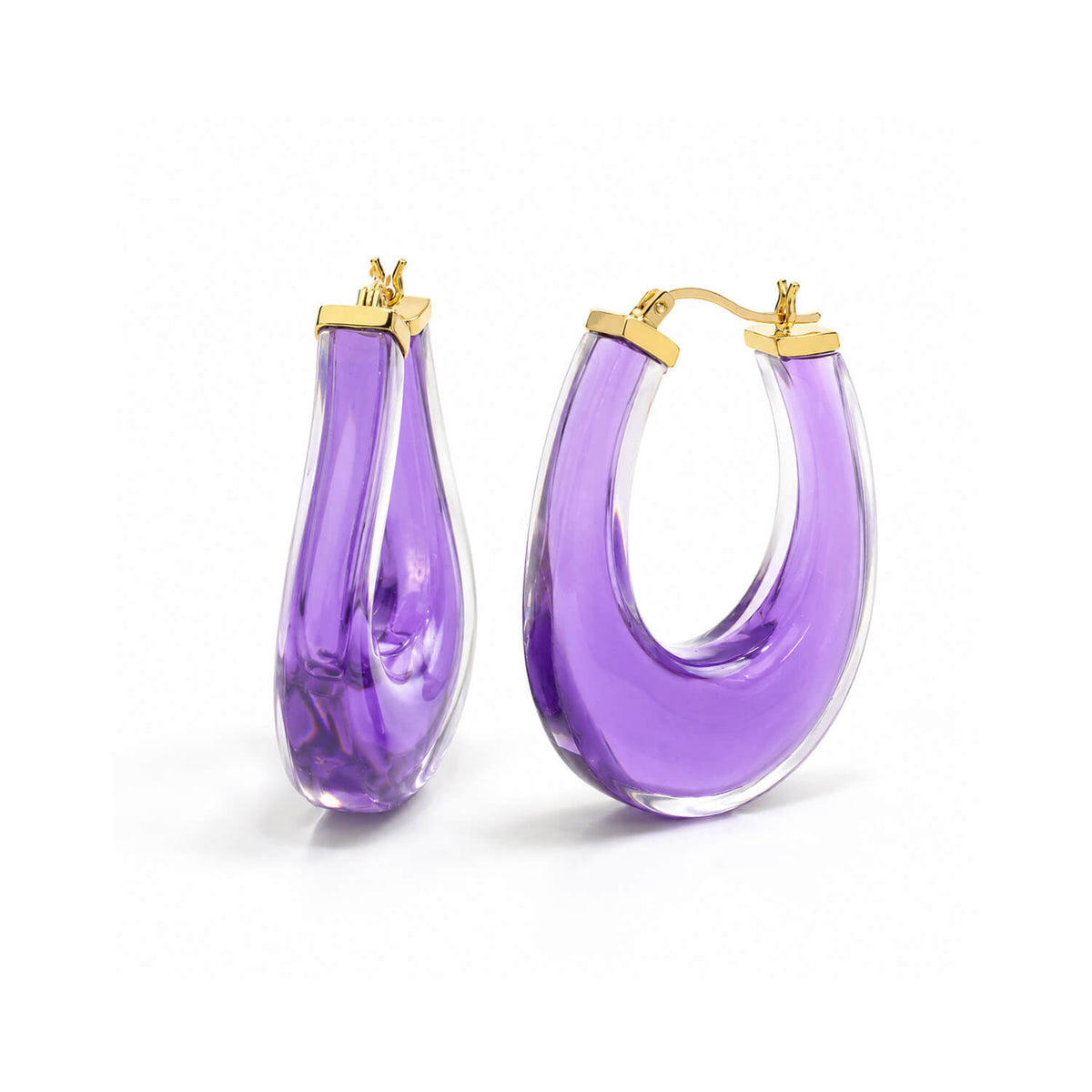 A pair of purple translucent hoop earrings with gold-tone posts, displayed on a clean white background.