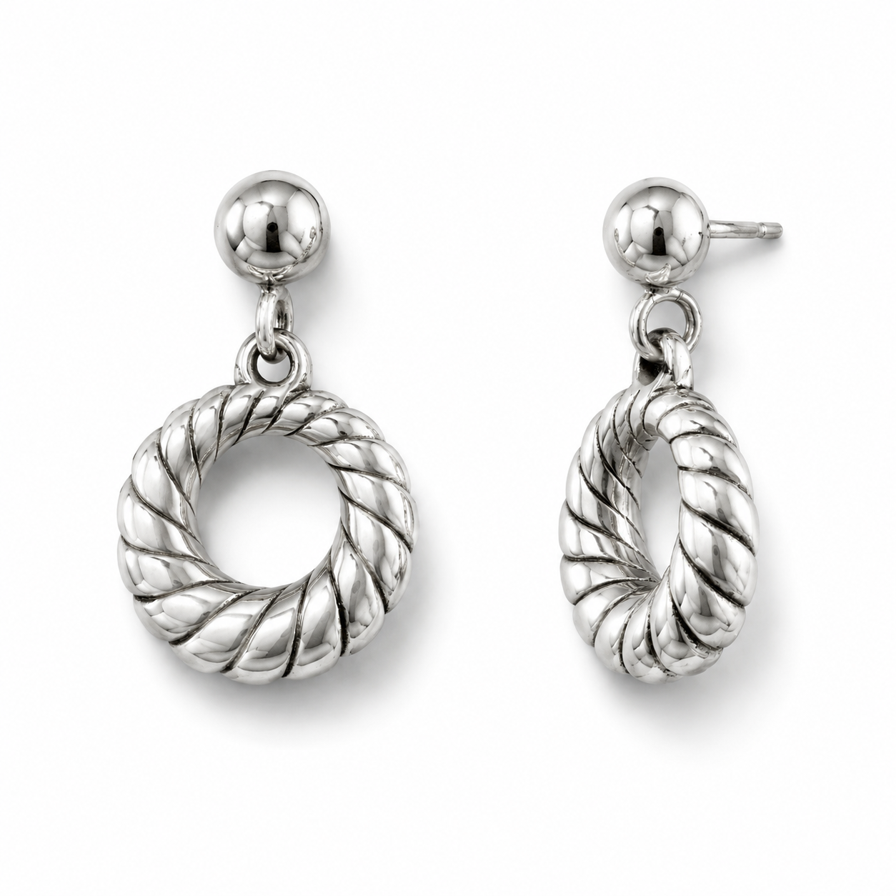 Pair of silver hoop earrings on a white background