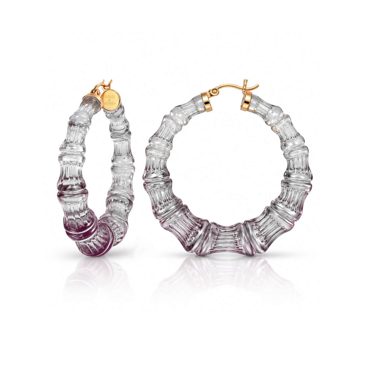winter ombre black and purplish bamboo hoop earrings on white background