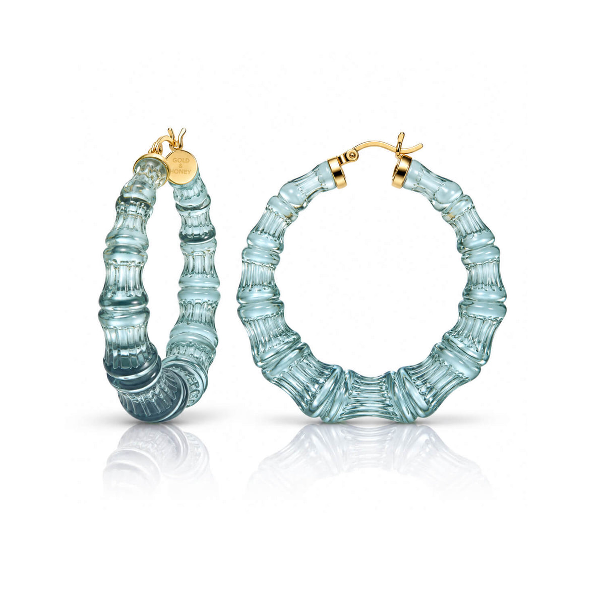 TEAL BAMBOO HOOP EARRING ON A WHITE BACKGROUND
