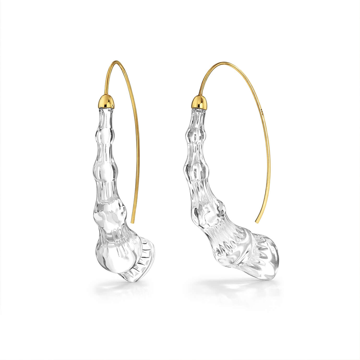 Clear earrings with gold accents on a white background
