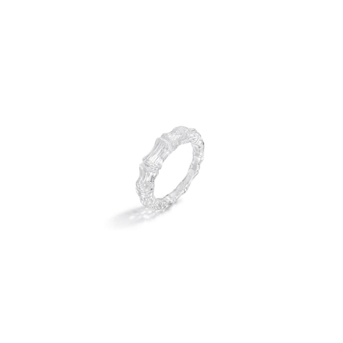 clear ring with a textured band on a white background