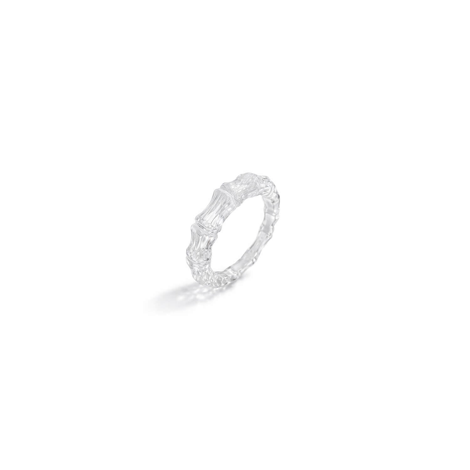 clear ring with a textured band on a white background