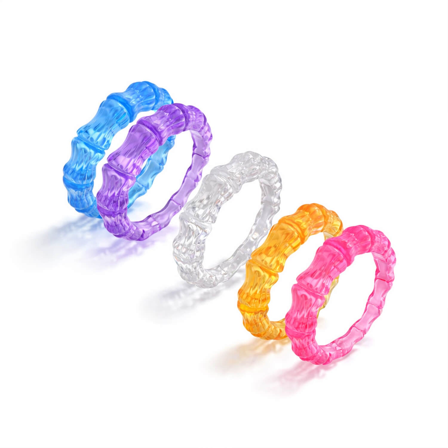Set of five colorful bamboo rings on a white background