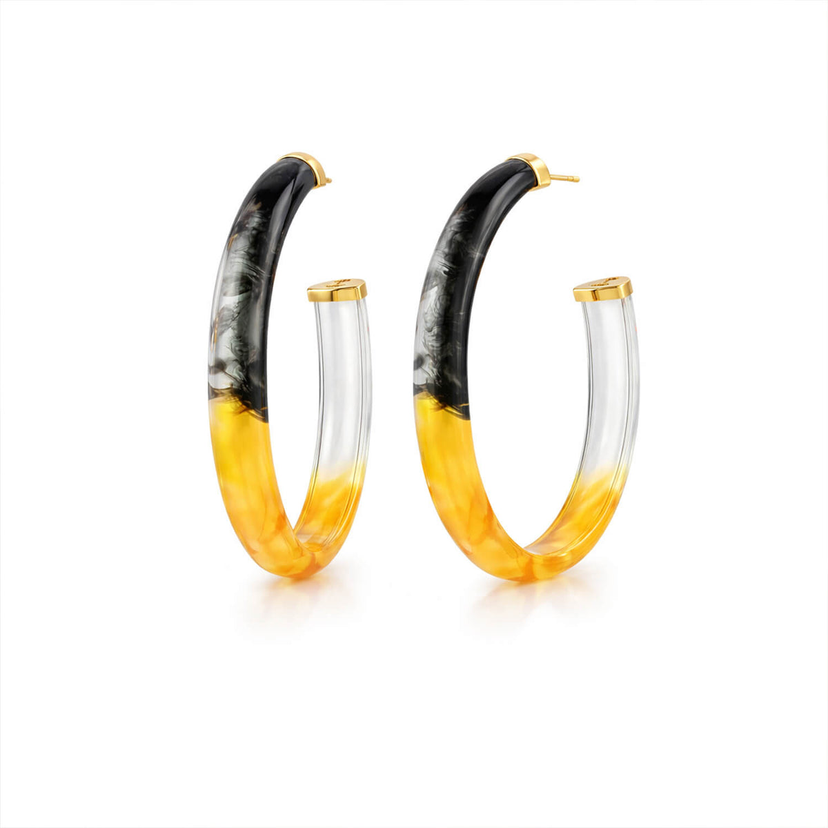 Pair of hoop earrings with black, yellow, and clear gradient design on a white background