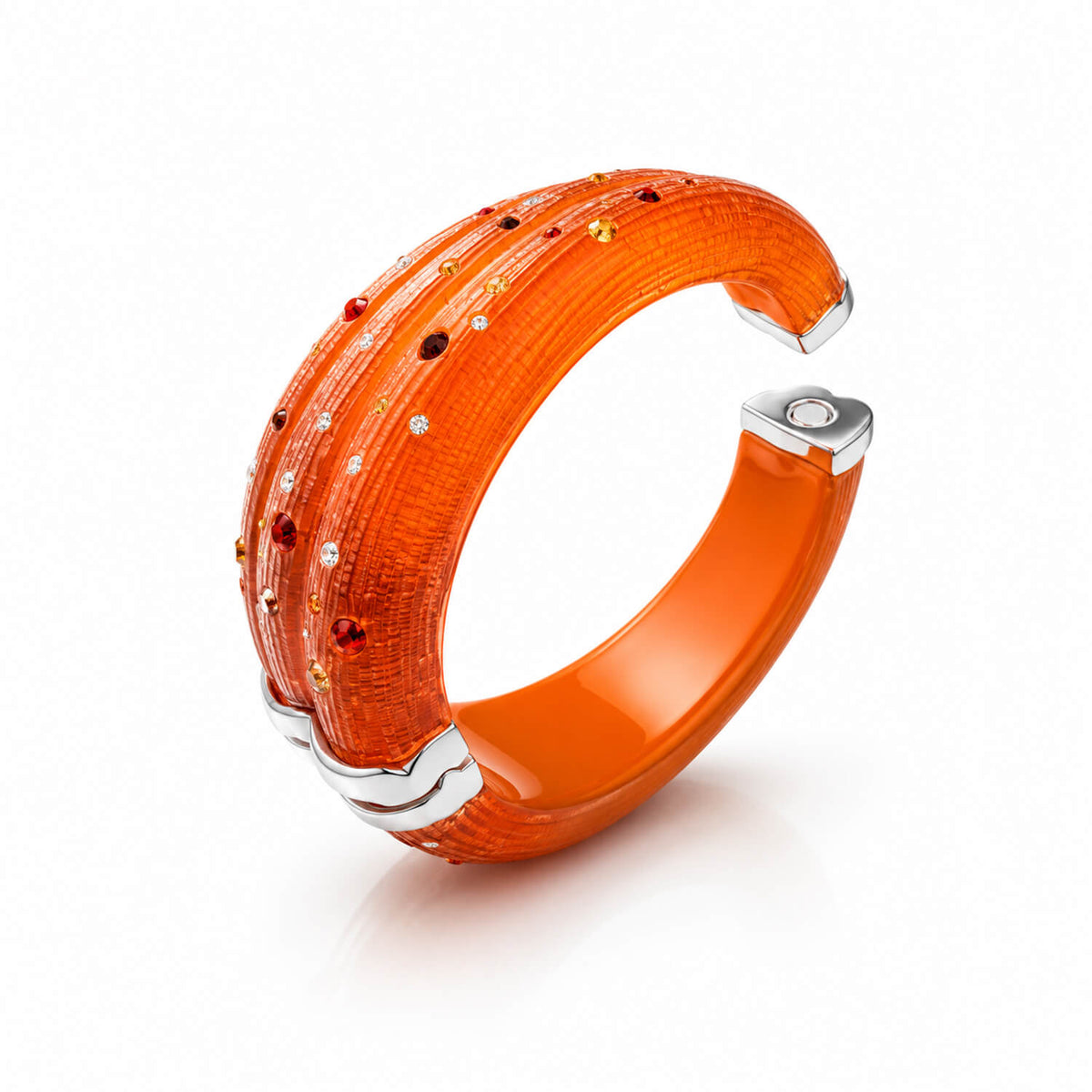 Orange bracelet with silver accents on a white background