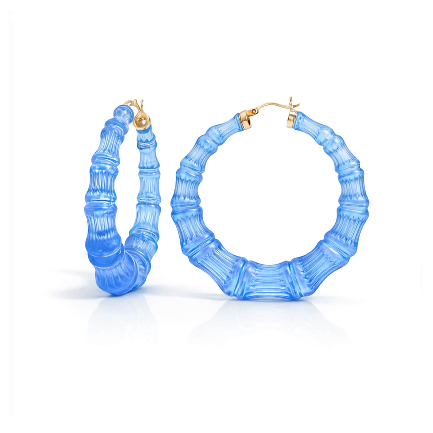 Blue hoop earrings with gold accents on a white background