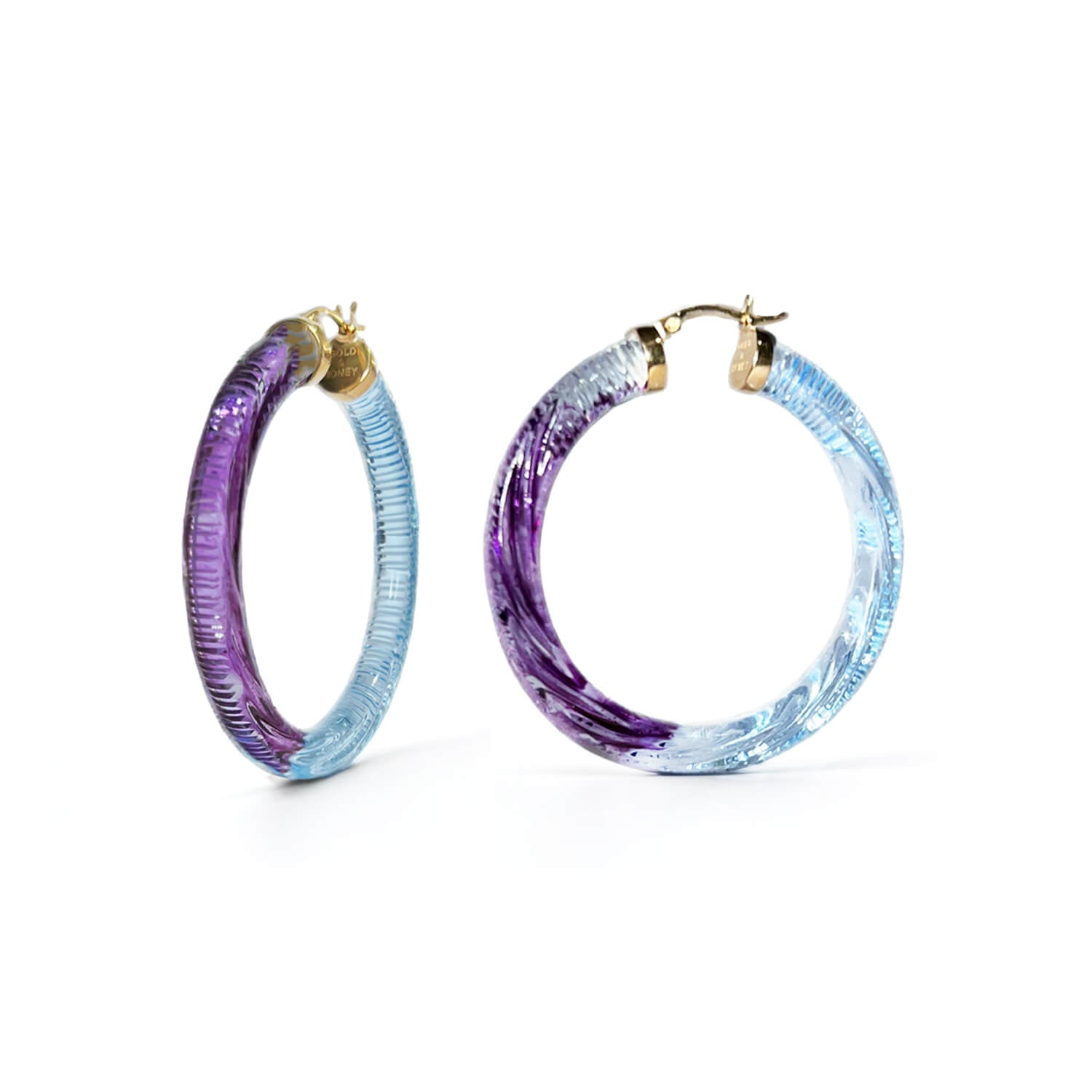 diamond cut earrings in purple and blue lucite