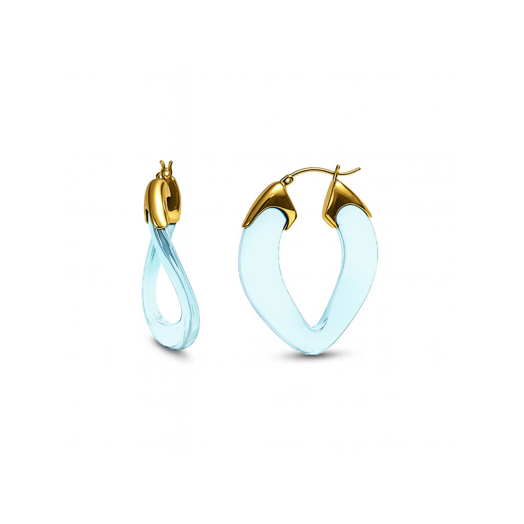 Gold and light blue hoop earrings on a white background