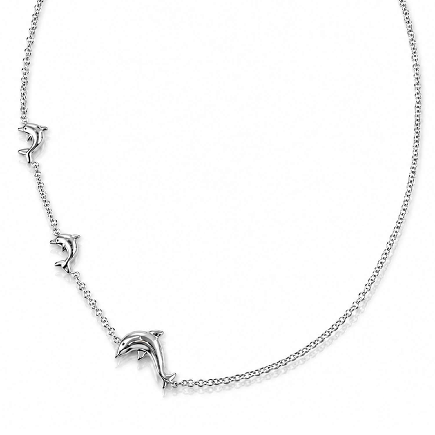Silver necklace with dolphin charms on a white background