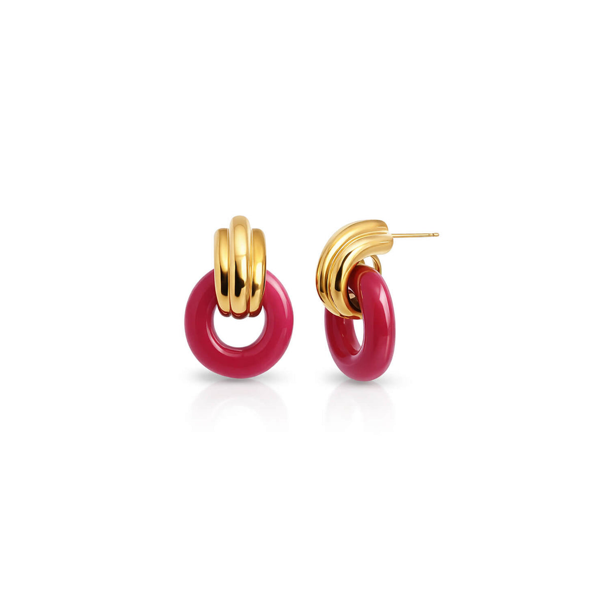 Gold and pink hoop earrings on a white background