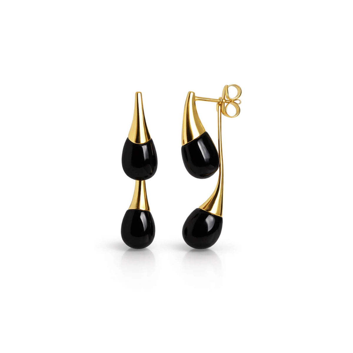 Gold and black earrings on a white background