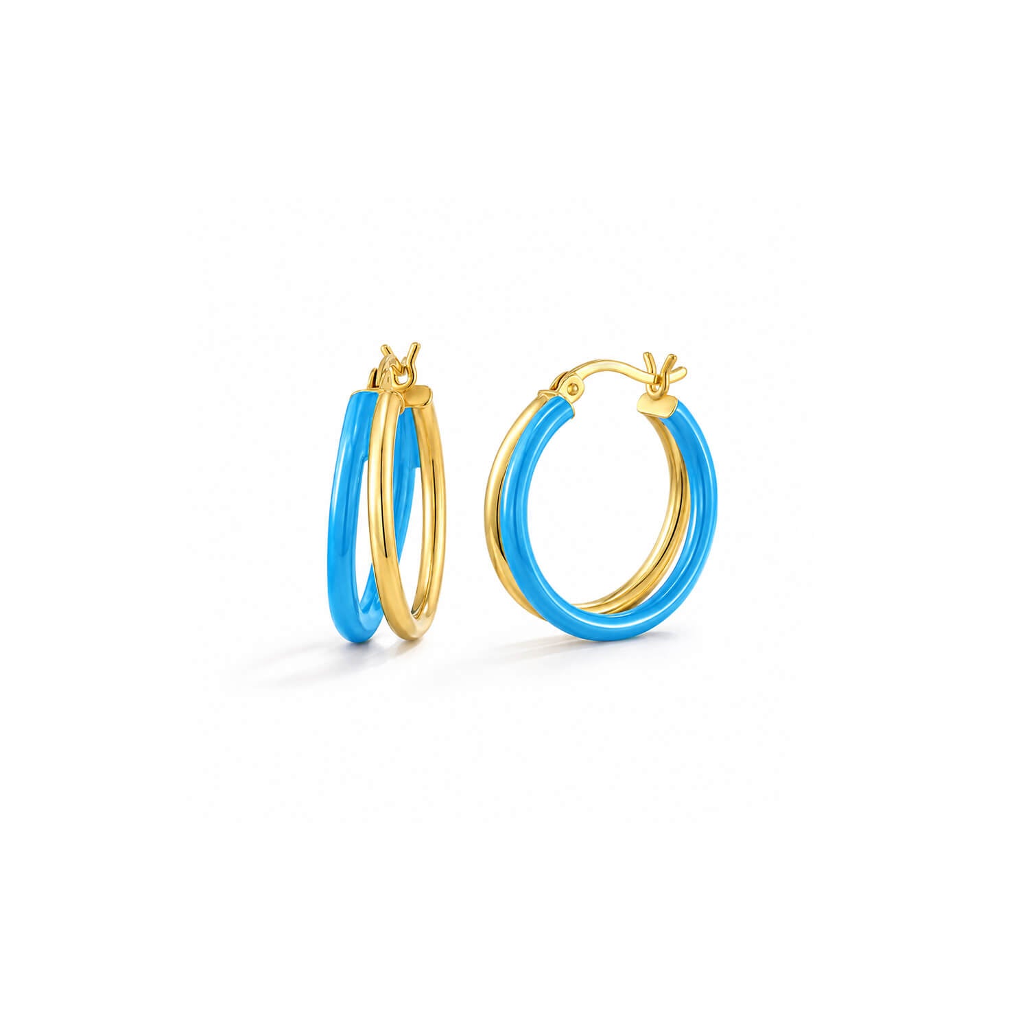 A pair of gold hoop earrings with a bright blue enamel inlay, shown on a clean white background.