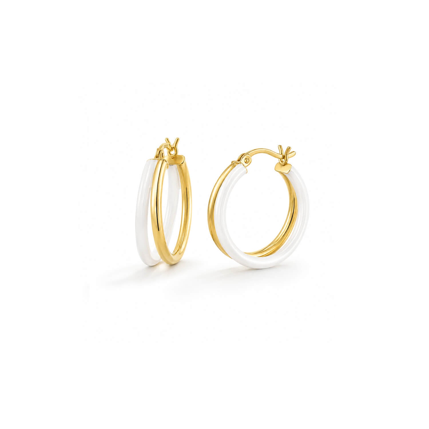 A pair of gold hoop earrings with a white inlay, shown on a clean white background.