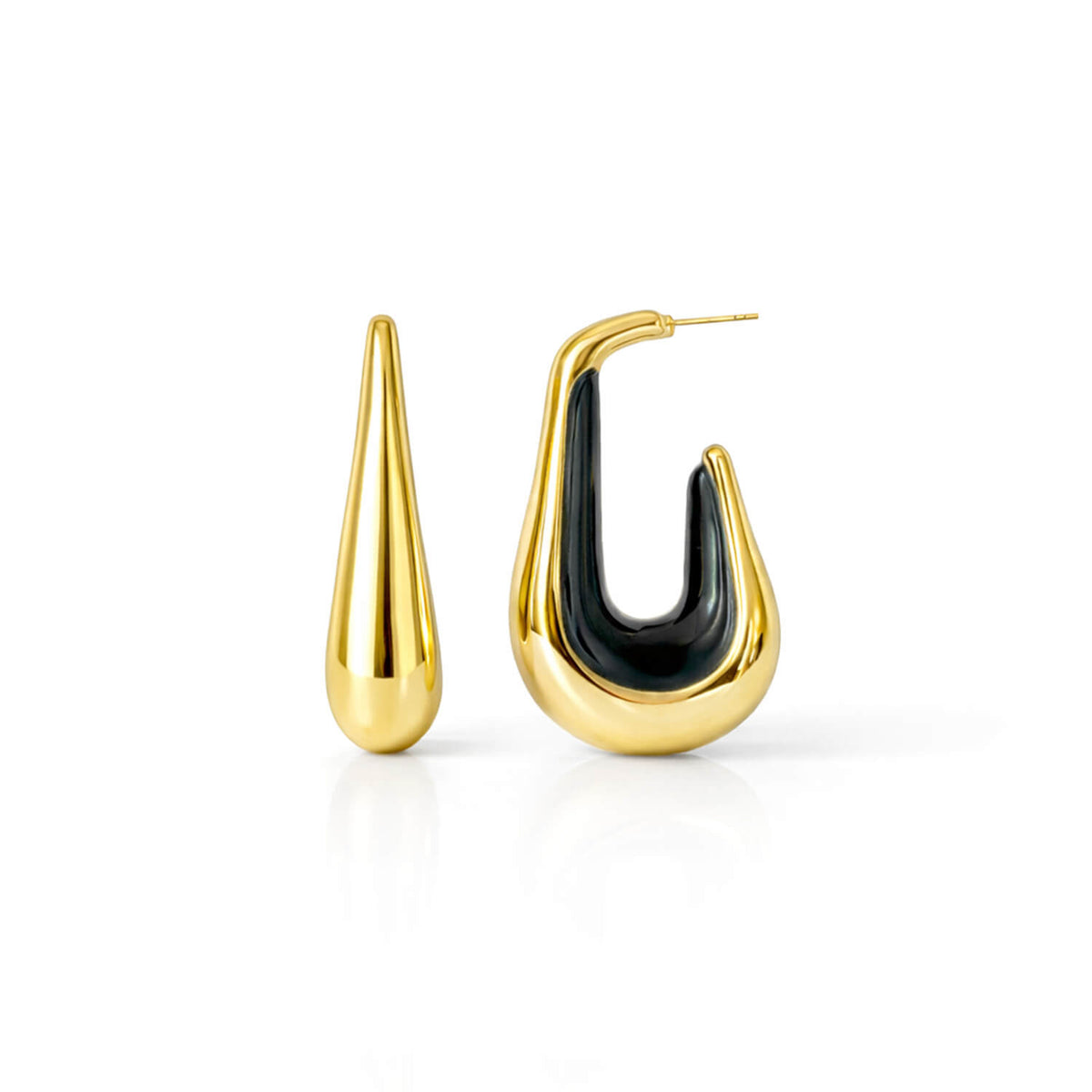 Gold hoop earrings with black centers on a white background
